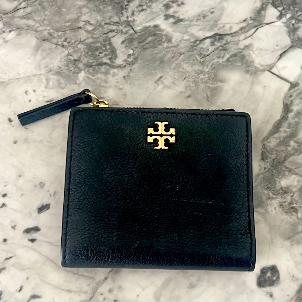 Like new Tory Burch black and gold leather wallet